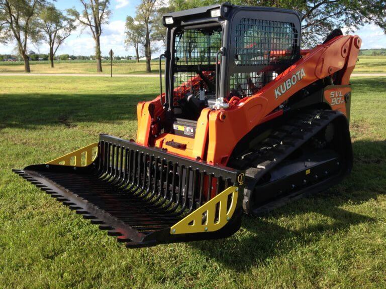 CL Fabricator Skid Steer Rock Bucket attached to skid steer