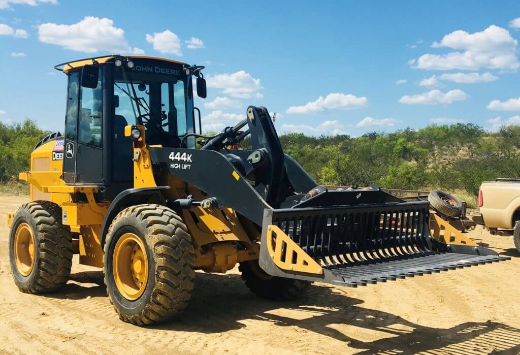 CL Fabricator Skid Steer Rock Bucket attached to tractor